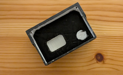 Black-painted interior of case